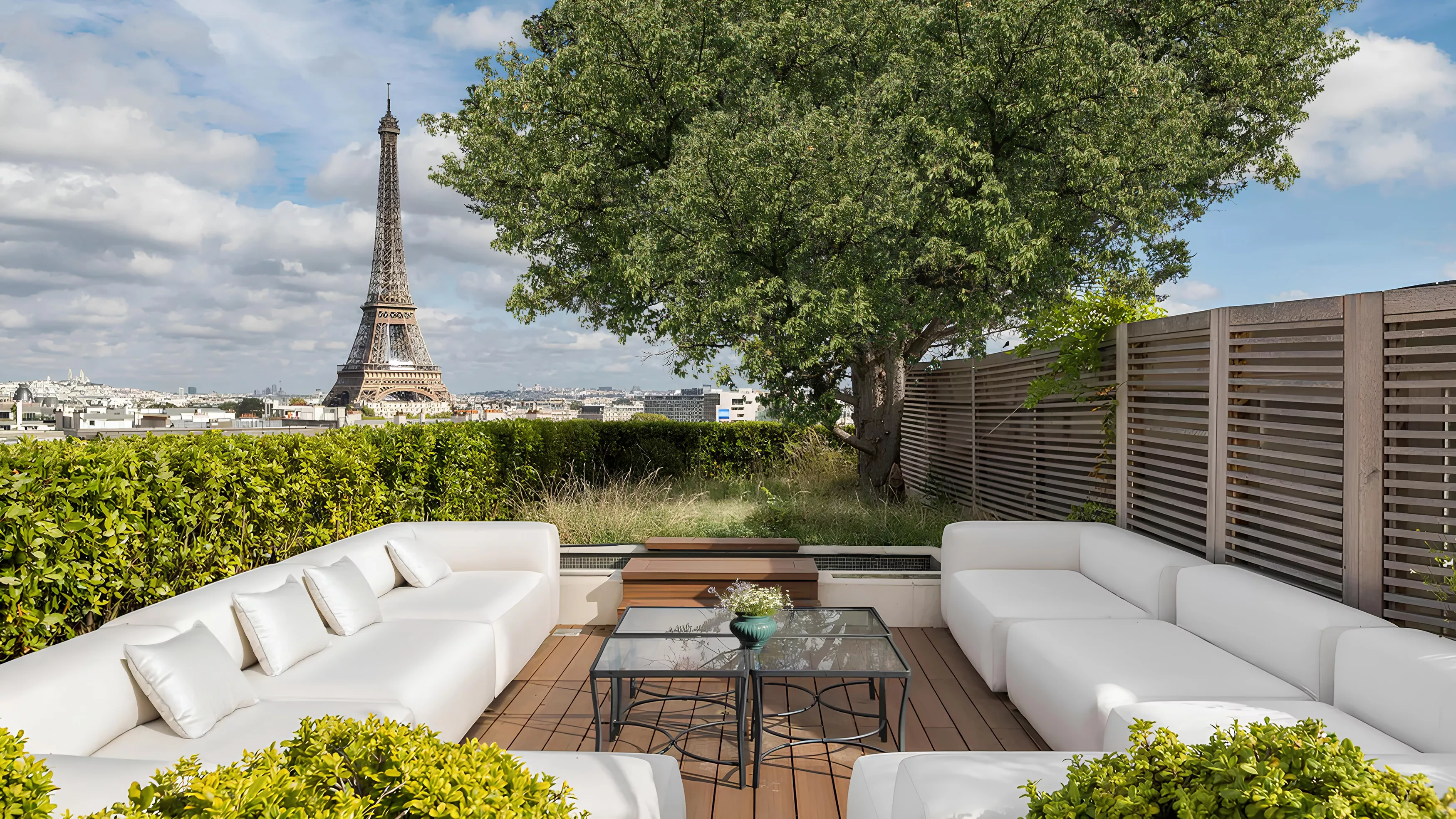 Terrace of a luxury top floor apartment with a view of the Eiffel Tower in Paris