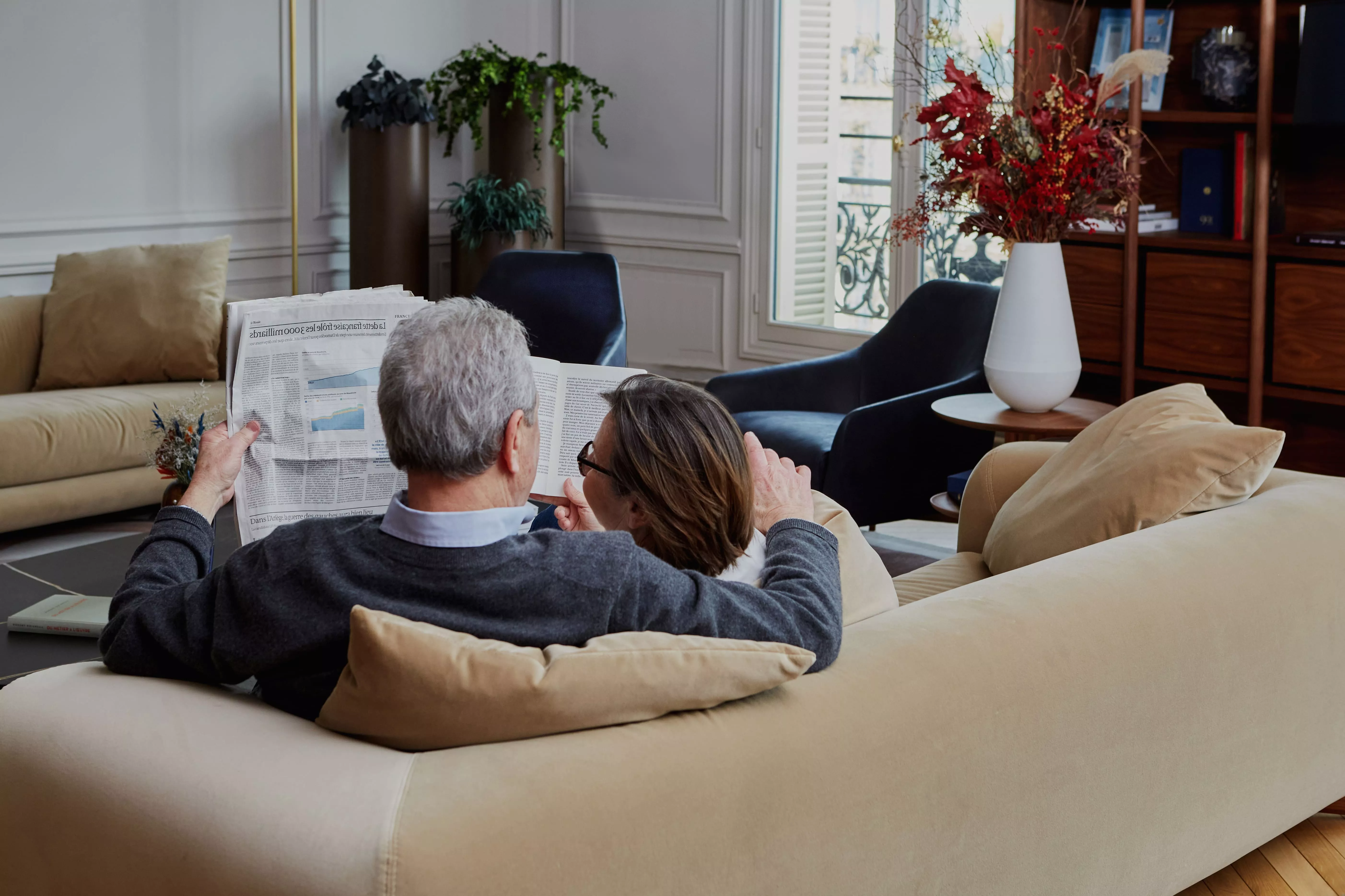 A senior couple in their home