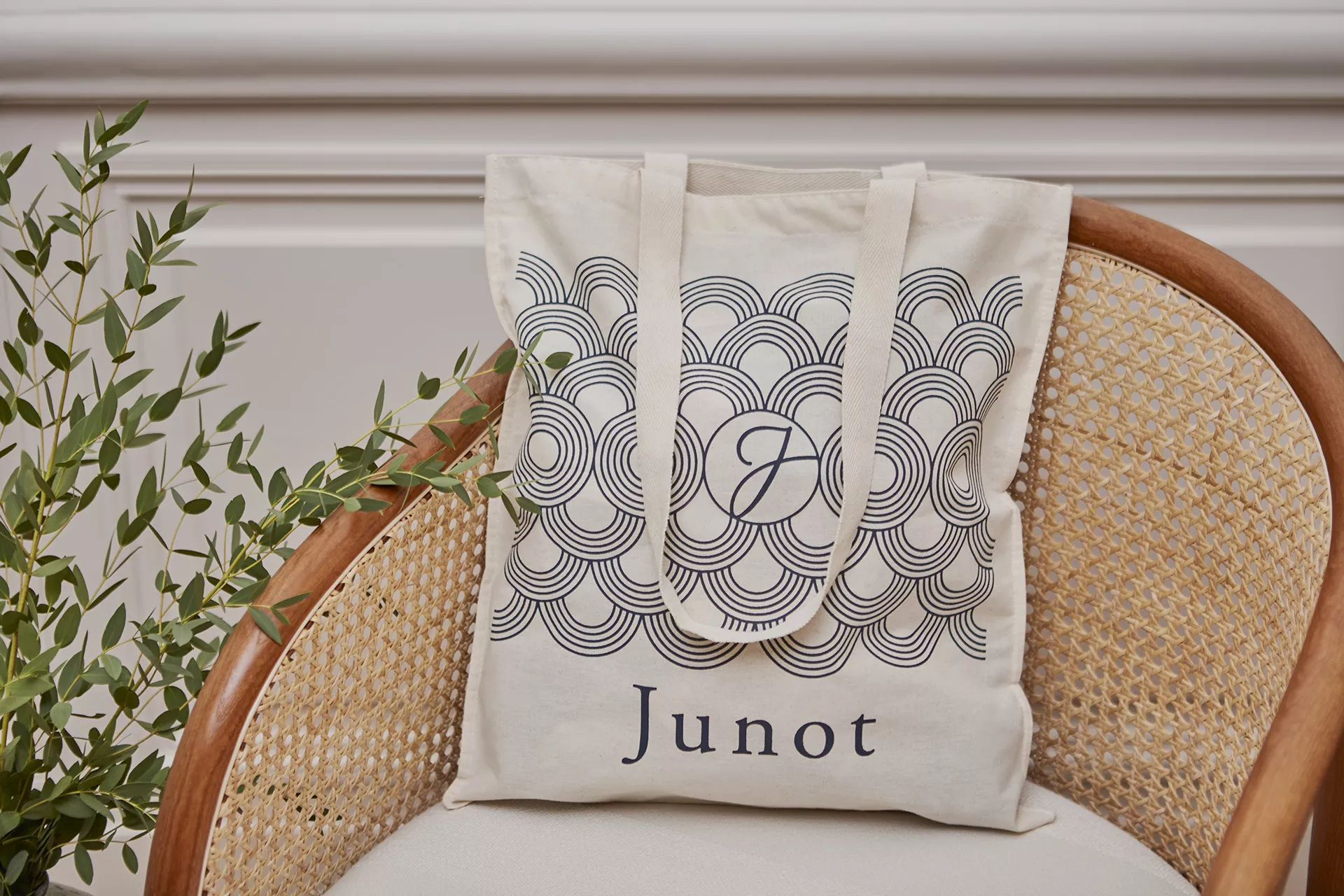 A Junot cotton tote bag offered to Junot customers